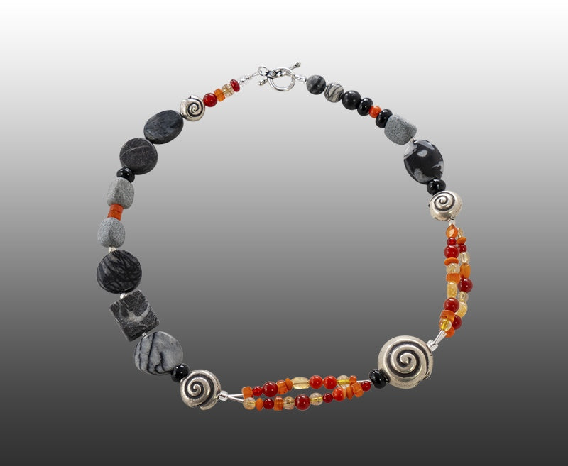 Necklace in sterling silver, carnelian and citrine reflecting Tasmanian flora, fungi and kelp. Made by Adelaide silversmith Suzette Watkins