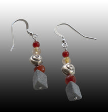 Earrings in sterling silver, carnelian and citrine reflecting Tasmanian flora, fungi and kelp. Made by Adelaide silversmith Suzette Watkins